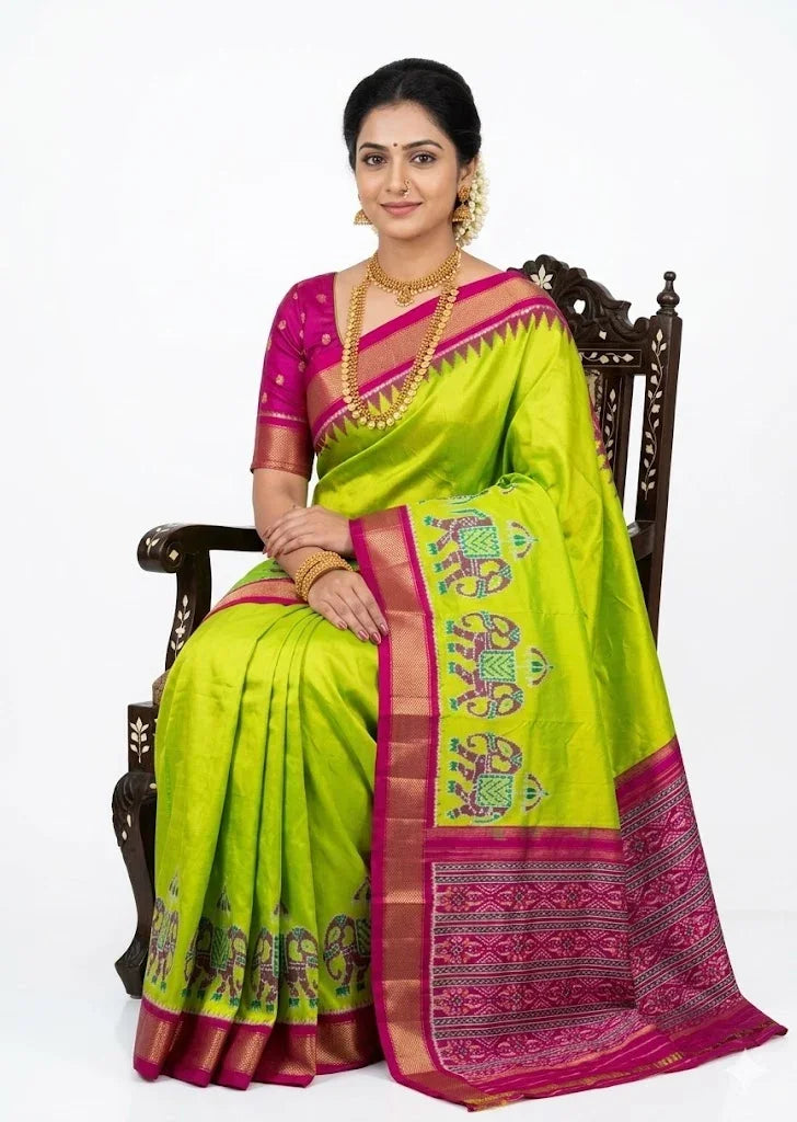 Vibrant Parrot Green Traditional Silk Saree with Pink Zari Border & Elephant Motifs - pochampallysarees.com