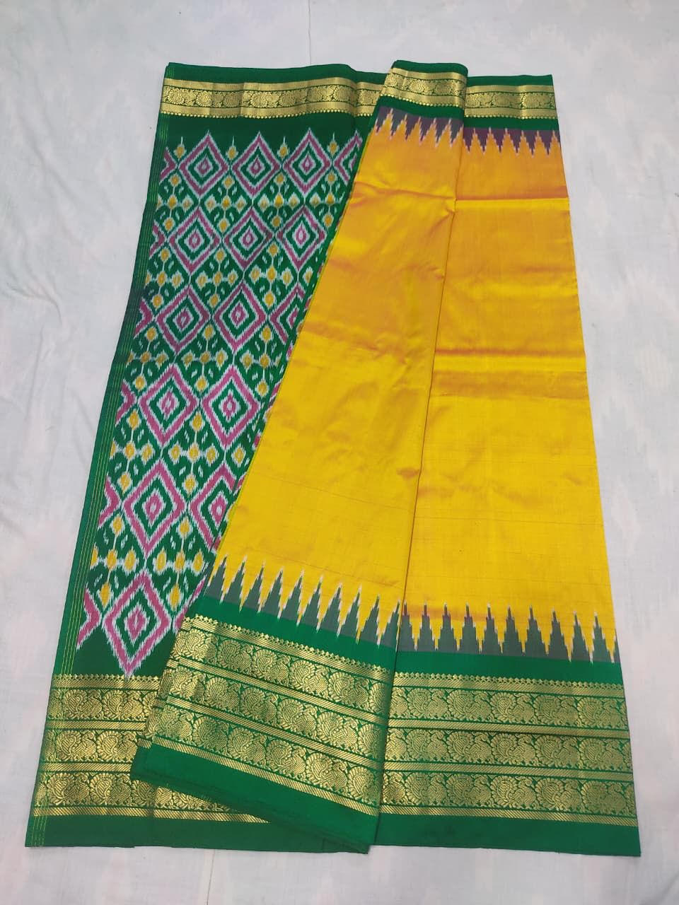 Traditional Handwoven Pochampally Ikkat Silk Saree in Bright Yellow & Emerald Green Pallu & Blouse Same Ikkat Design