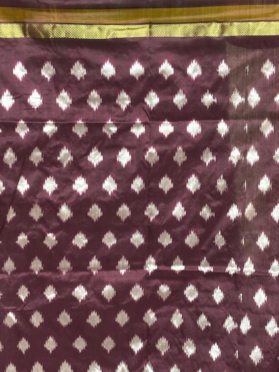 Pochampally Ikkat Silk Sari with silver plain border and chocolate palluPochampally Ikkat Silk Sari with silver plain border and chocolate pallu