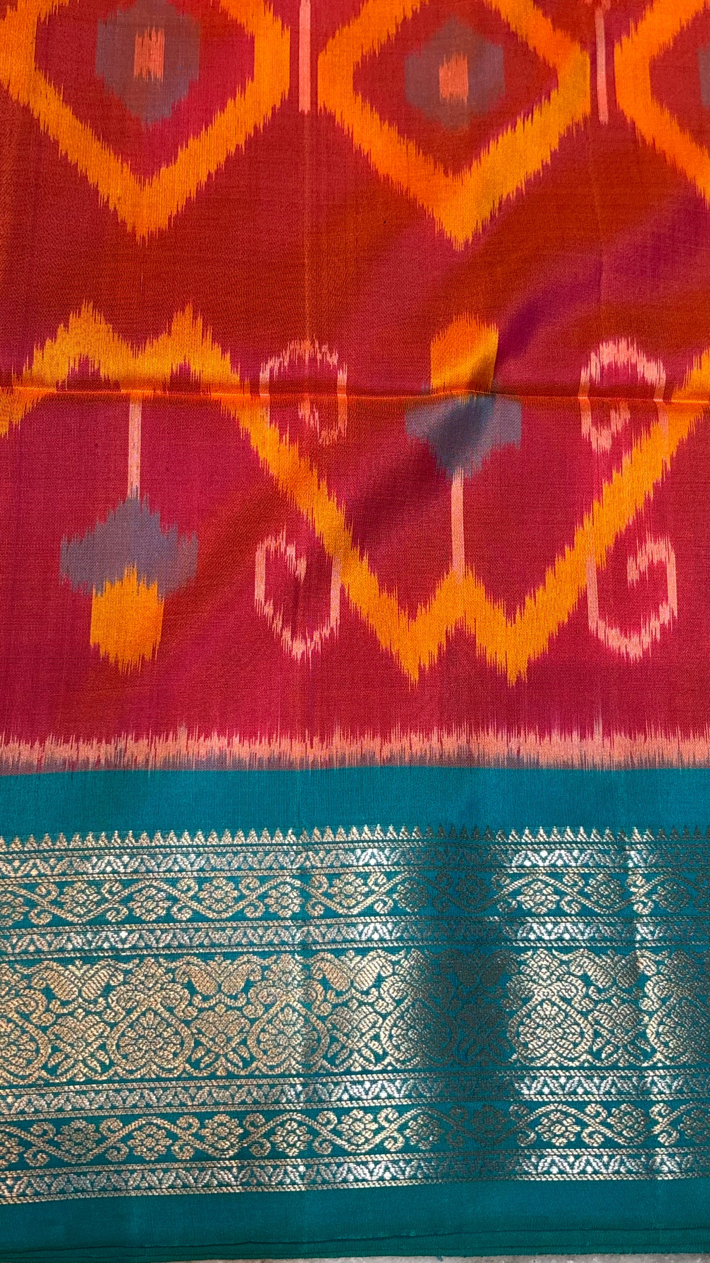 Kanchi Soft Silk Ikat Orange and Blue Saree