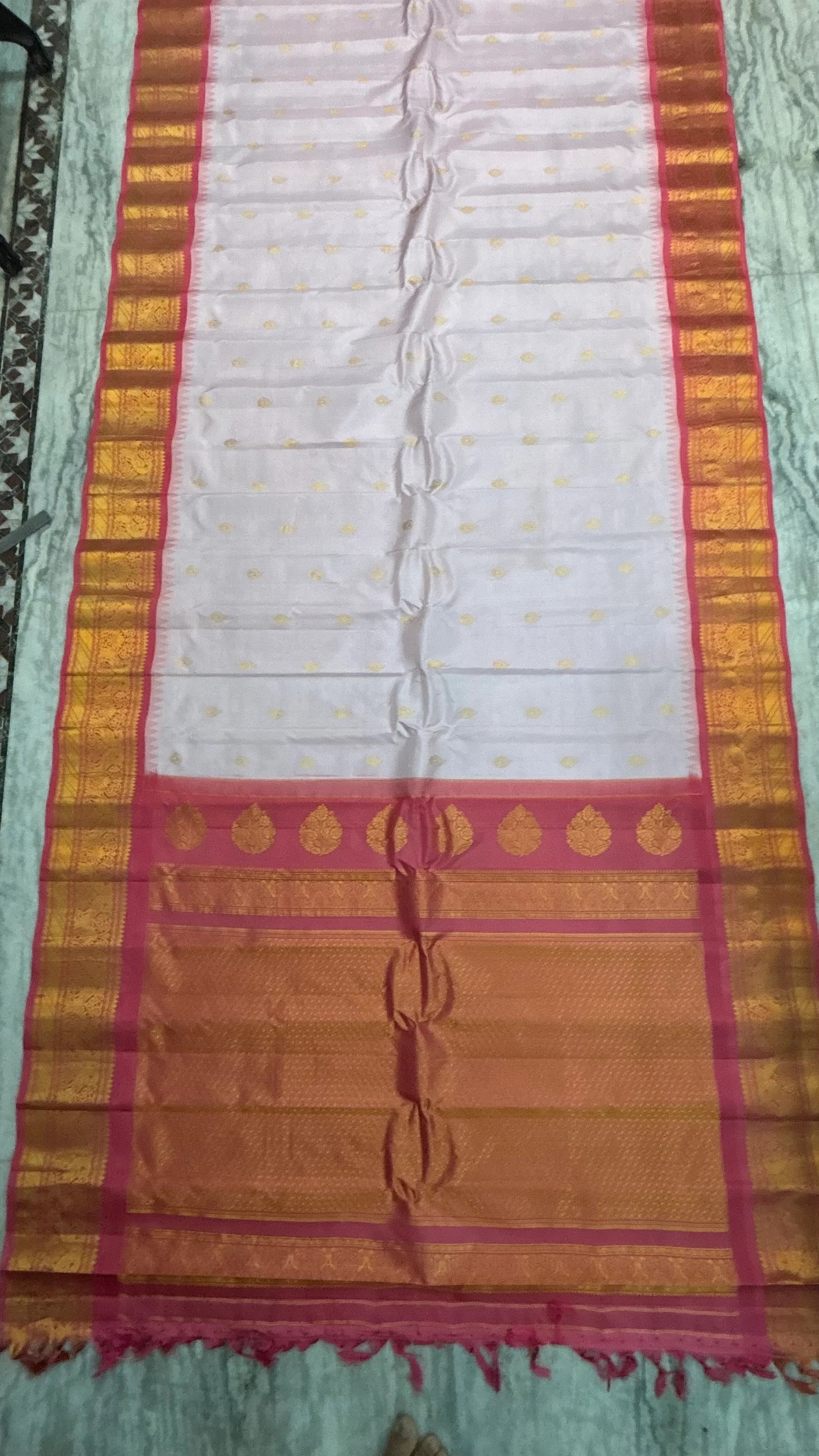 Elegant Off-White Pure Silk Saree with Contrasting Pink Zari Border and Mango Buttas - pochampallysarees.com