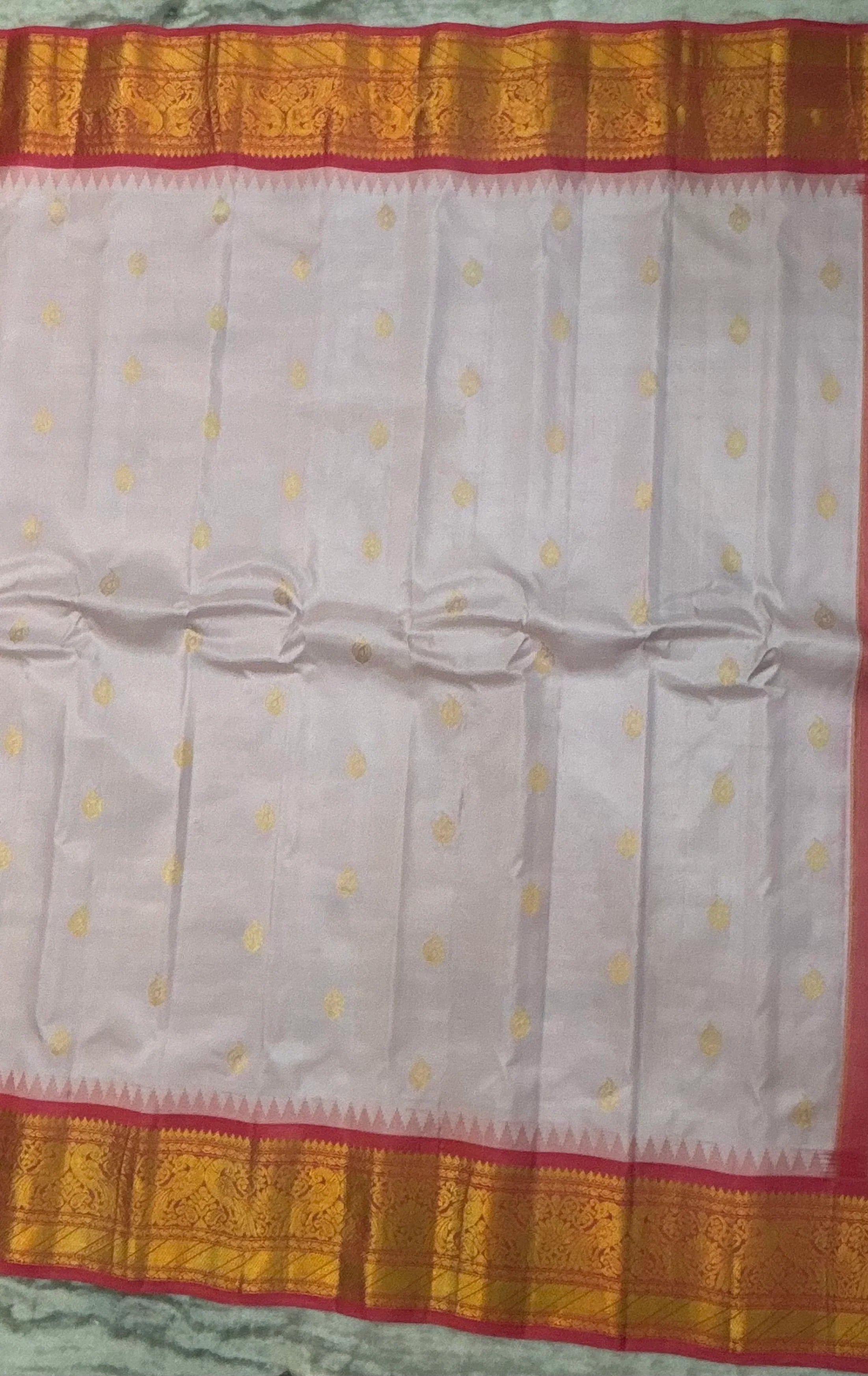Elegant Off-White Pure Silk Saree with Contrasting Pink Zari Border and Mango Buttas - pochampallysarees.com