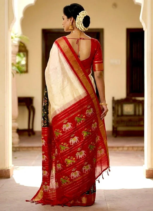 Traditional Cream & Red Ikkat Silk Saree with Black Elephant Motif Border | Pochampally Handloom - pochampallysarees.com
