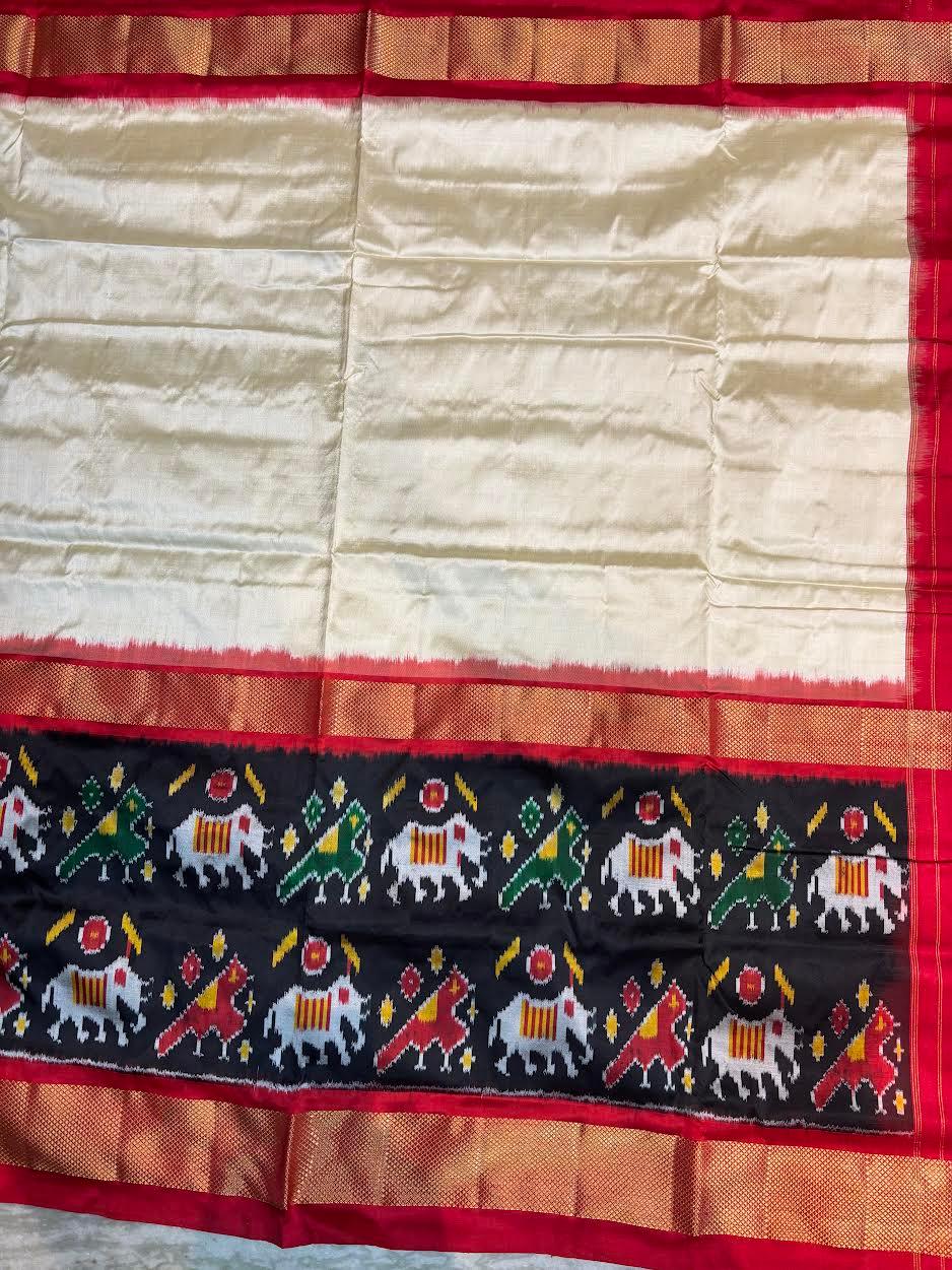 Traditional Cream & Red Ikkat Silk Saree with Black Elephant Motif Border | Pochampally Handloom - pochampallysarees.com