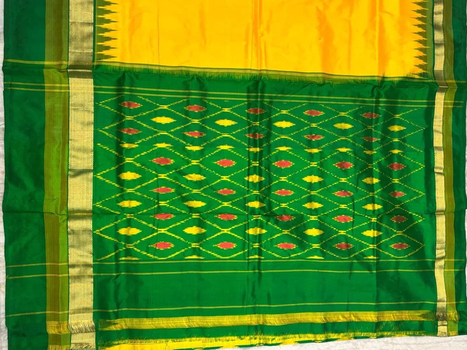 Pure Ikkat Silk Saree in Vibrant Yellow & Emerald Green | Traditional Temple Border with Woven Zari - pochampallysarees.com