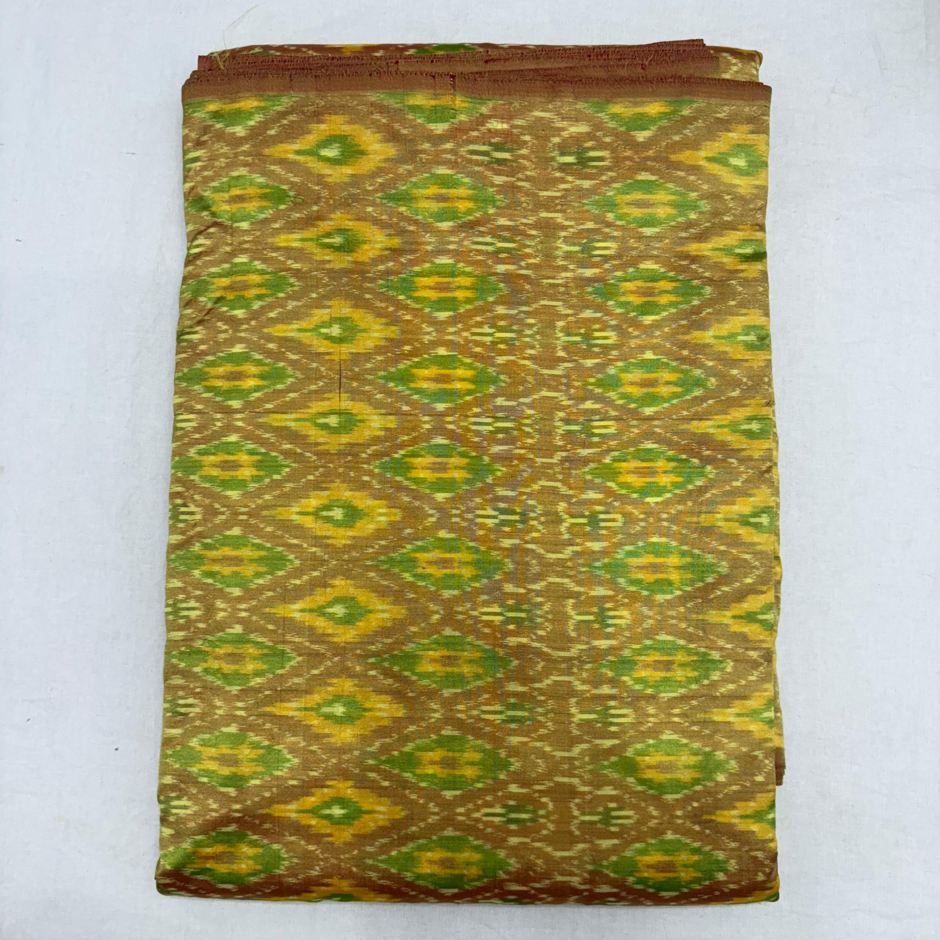 HAND WOVEN DOUBLE IKAT SOFT SILK PARROT GREEN FABRIC - pochampallysarees.com