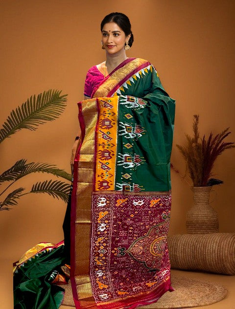 POCHAMPALLY IKKAT SILK PATOLA MIDDLE GREEN BORDER AND PALLU RED ZARI BORDER RICH PALLU SAREE