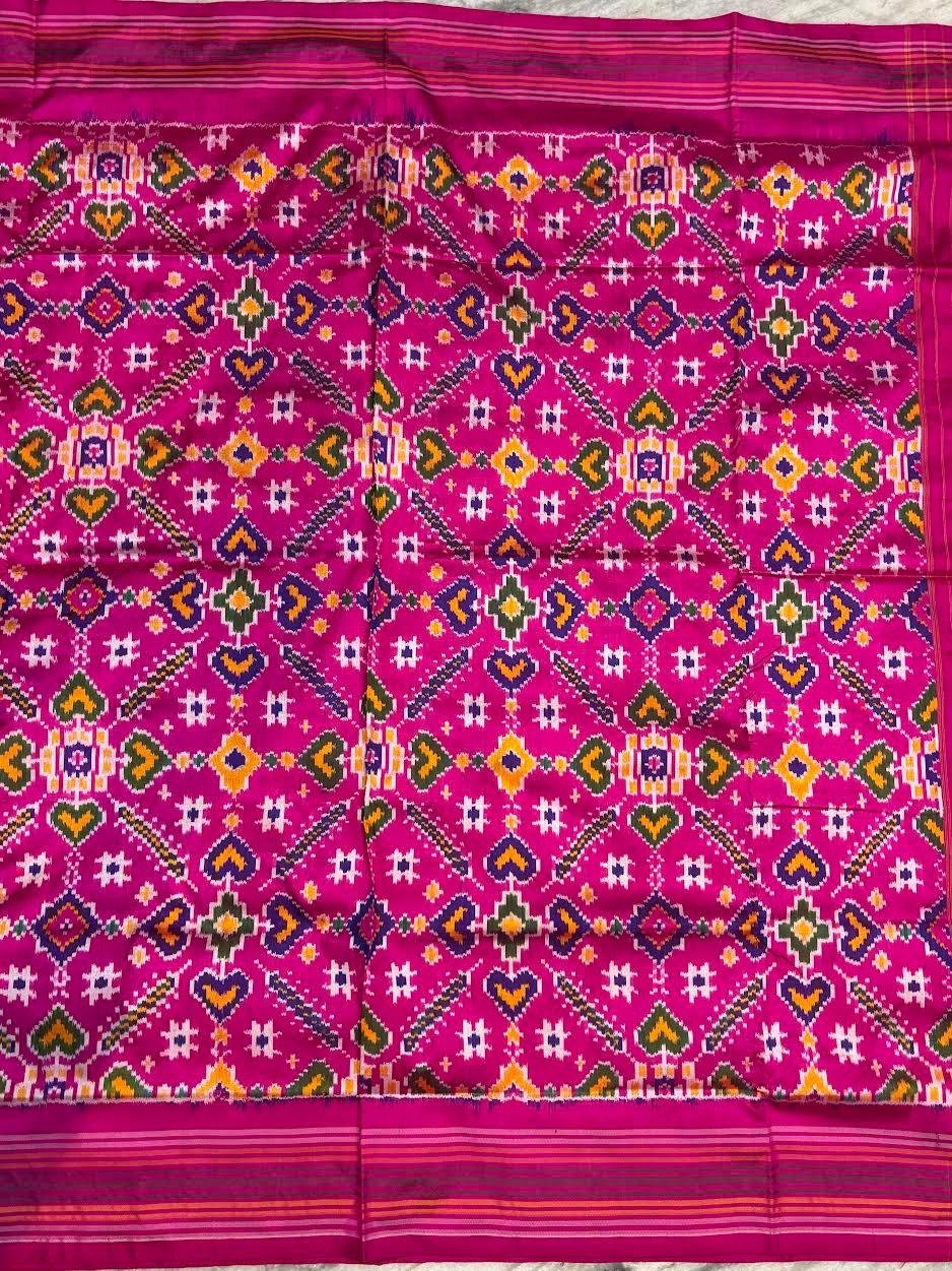 Pure Pochampally Ikat Patola Silk Saree in Magenta Pink | Handloom Geometric Pattern Pattu Saree with Designer Pallu | Traditional Wedding & Festive Wear - pochampallysarees.com