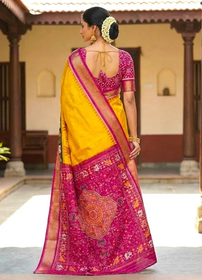 POCHAMPALLY IKKAT SILK BODY MANGO YELLOW BORDER PINK AND PALLU AND BLOUSE IKKAT DESIGN PINK SARI - pochampallysarees.com