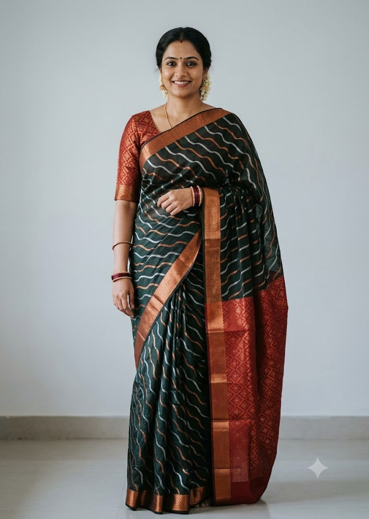 Woman wearing a traditional dark bottle green Kuppadam Pattu saree with wavy silver and copper zari stripes, copper zari border, and contrast maroon red floral brocade pallu and blouse.