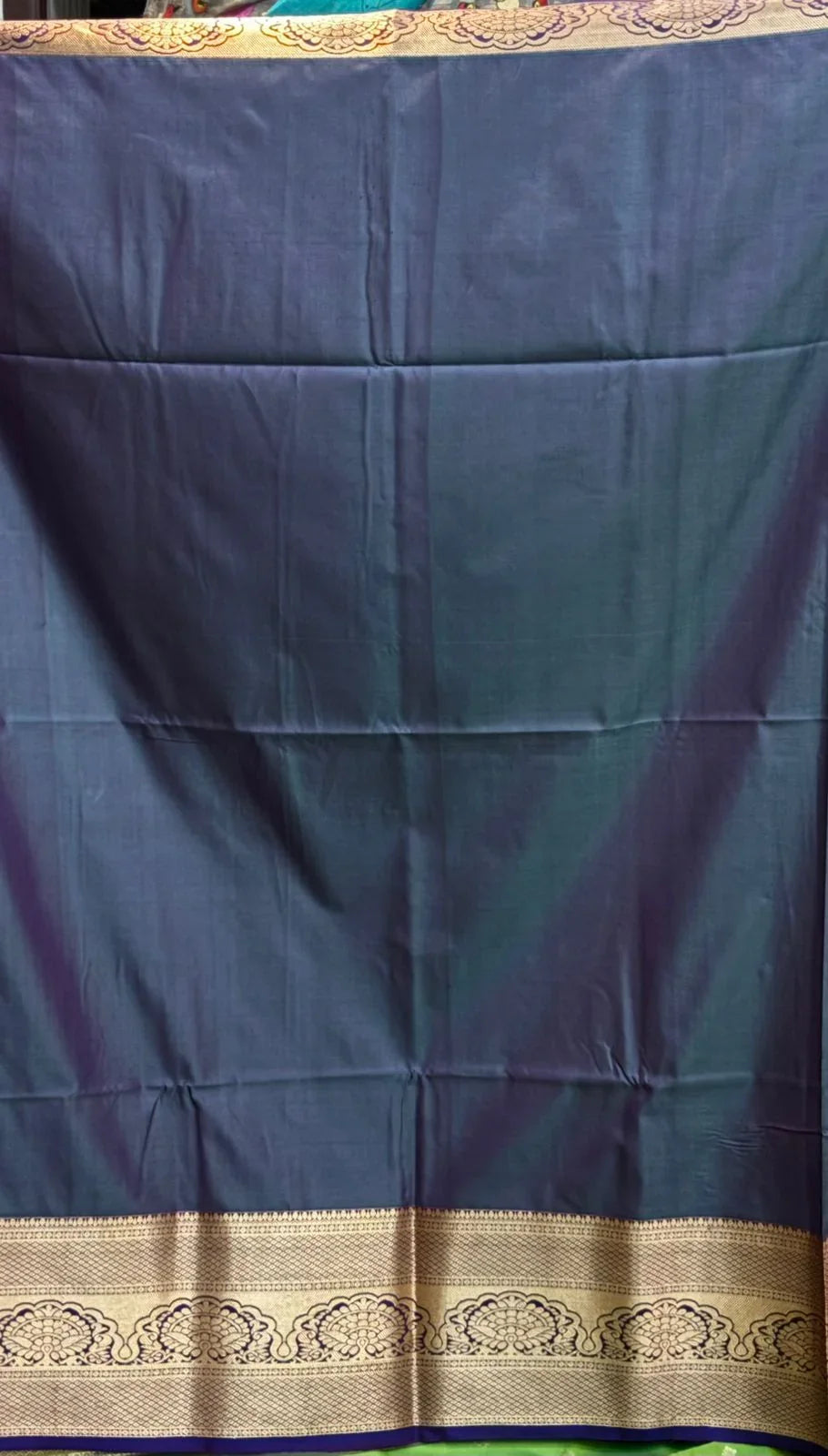 Dharmavaram Pattu Vibrant Lime Green Silk Saree with Intricate Silver Zari Border & Purple Accent - pochampallysarees.com