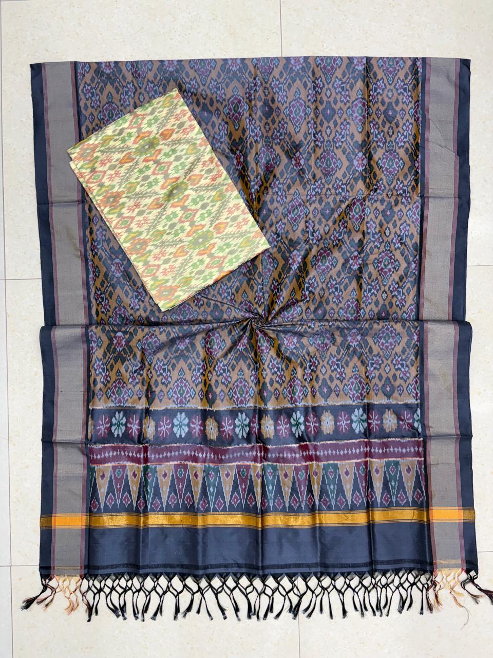 Handloom charcoal grey and bronze pure Pochampally Ikat silk saree with geometric weave pallu and contrast off-white blouse piece