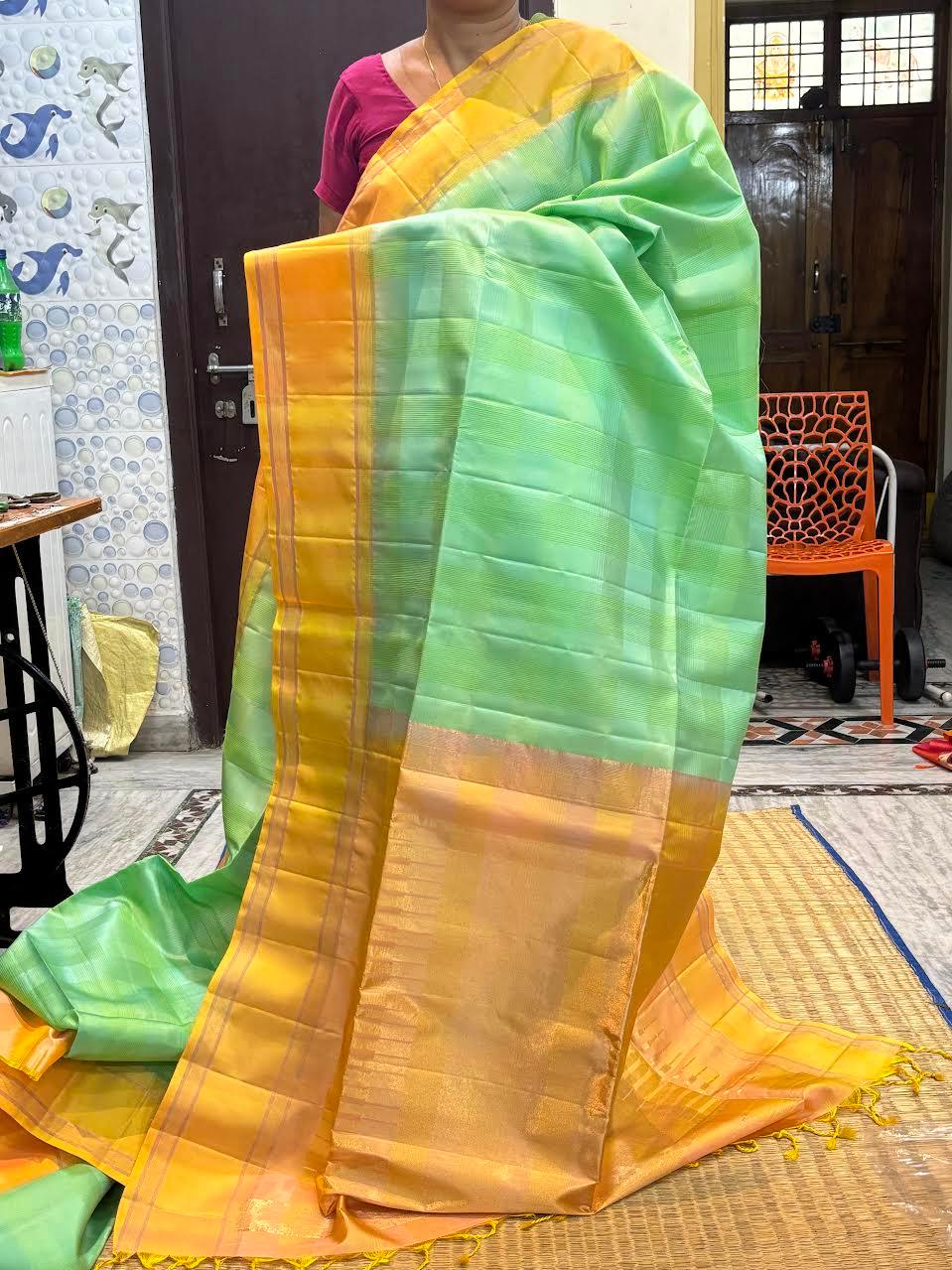 Kanchi Soft Silk Saree in Sea Green with Contrast Yellow Gold Zari Border