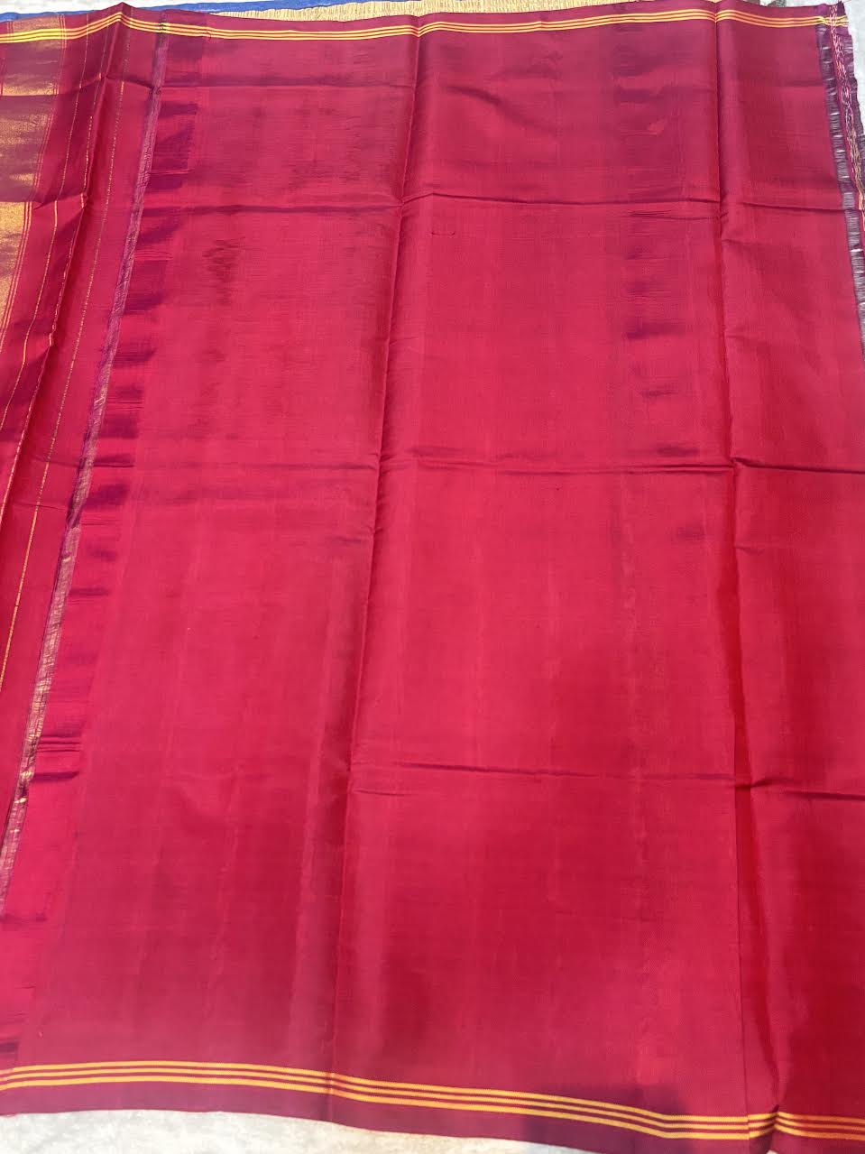 Maroon Real Ikkat Patola Silk Saree with Geometric Weave and Figural Border