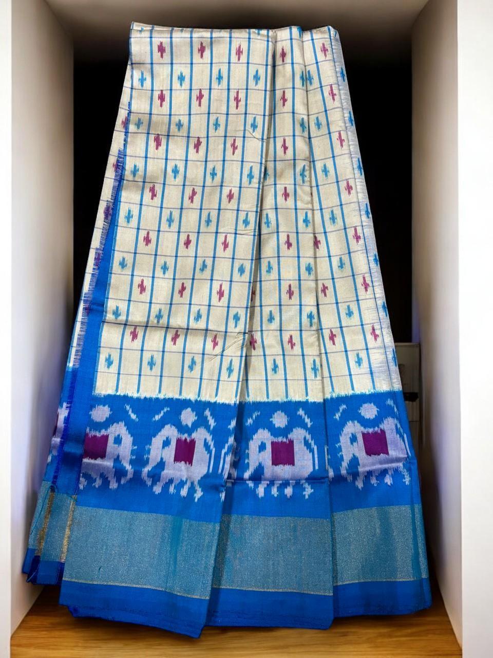 IKKAT KIDS CREAM BLUE COLOR LEHENGA - pochampallysarees.com