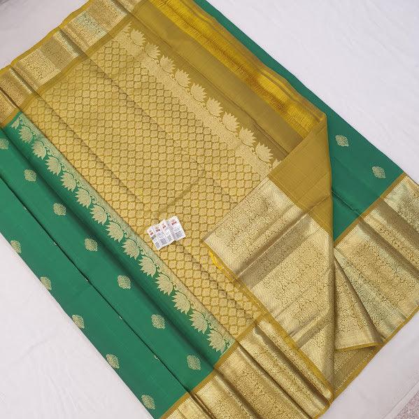 Kanchipuram Pure Silk Saree Rama Green And Yellow With Zari Woven Buttas And Long Zari Woven Kanchi Border - pochampallysarees.com
