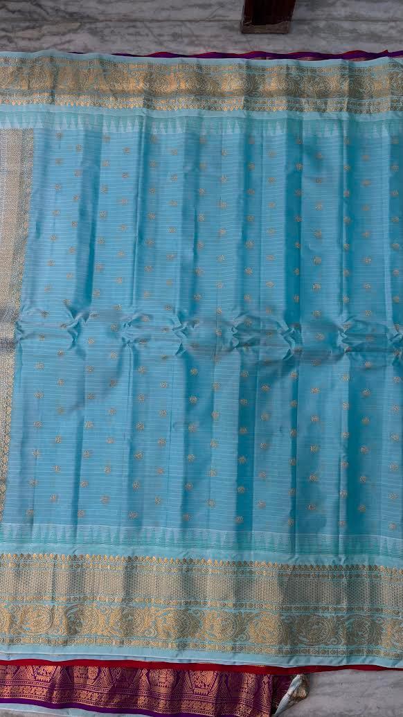 Pure Gadwal Silk Saree in Forest Green Checks with Light Blue Border - pochampallysarees.com