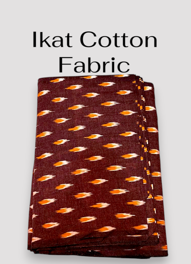 Pochampally ikat cotton fabric online. Pure cotton with vibrant orange motifs, perfect for kurtis, dresses, shirts, and crafts.