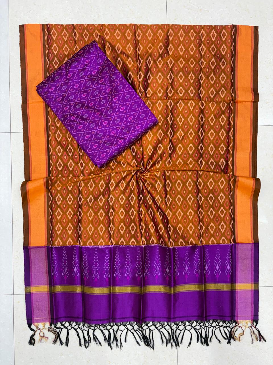 Mustard ochre pure Pochampally Ikat silk saree paired with contrast purple geometric pallu and matching blouse fabric