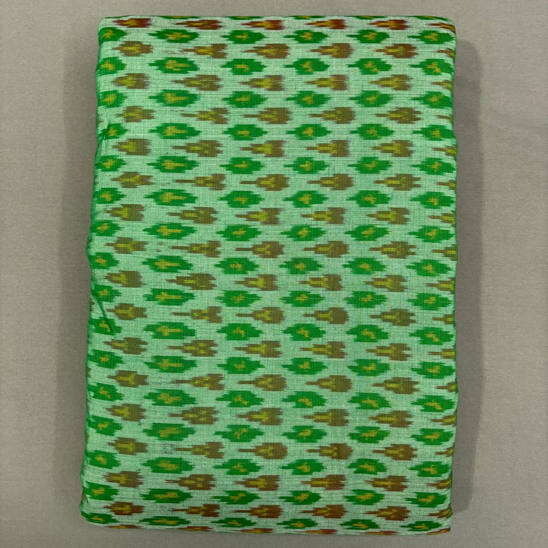 Handwoven Pochampally Ikkat Sico mint green fabric with green and olive Ikat buta motifs