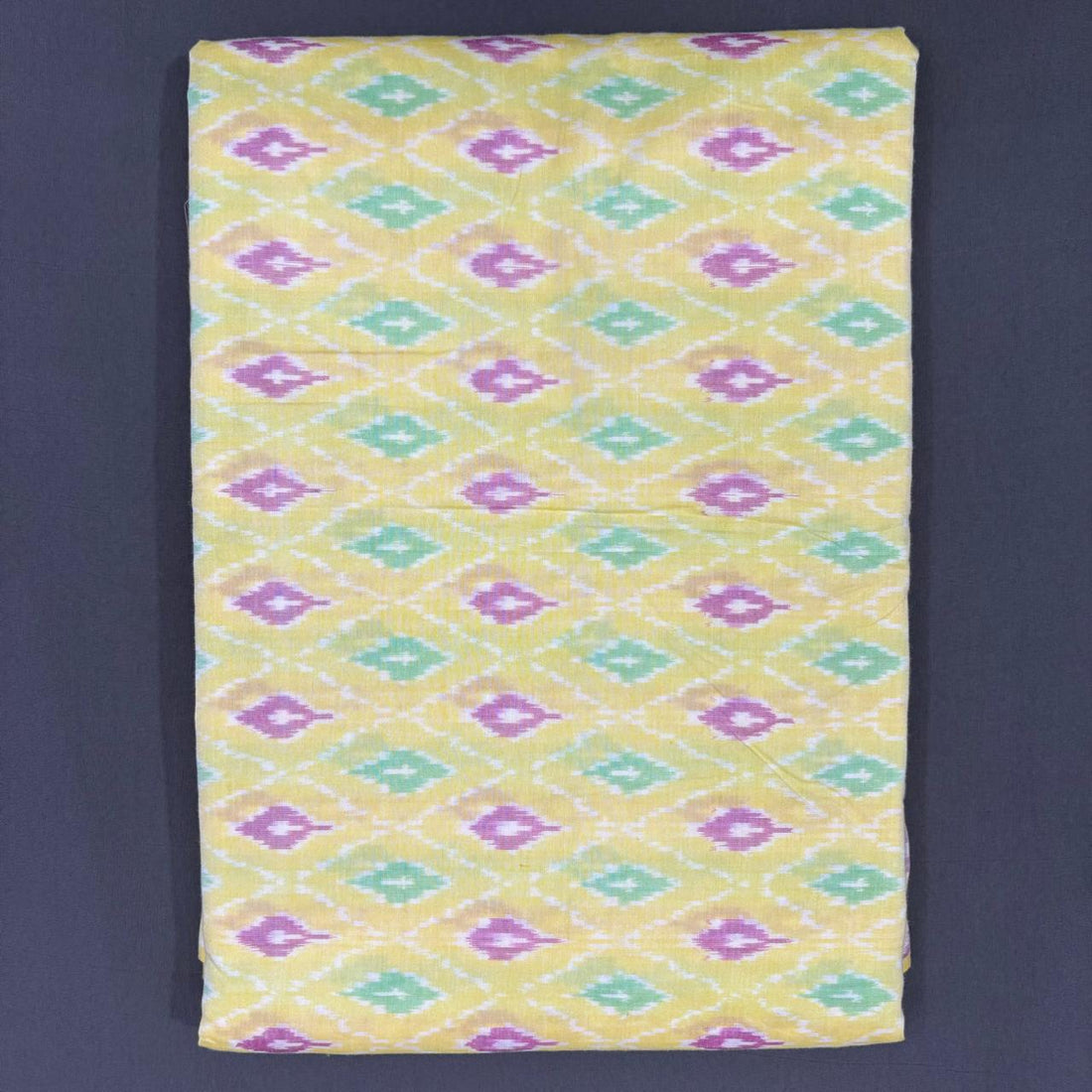 Handwoven Pochampally Ikkat Sico pastel lemon yellow fabric with lavender and mint green diamond motifs