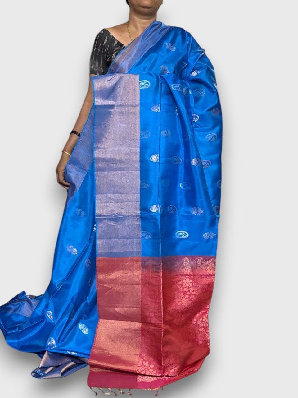 PURE SOFT SILK SAREE ANANDA BLUE AND RED WITH ALLOVER ZARI WEAVES BUTTAS IN GAP BORDER STYLE - pochampallysarees.com