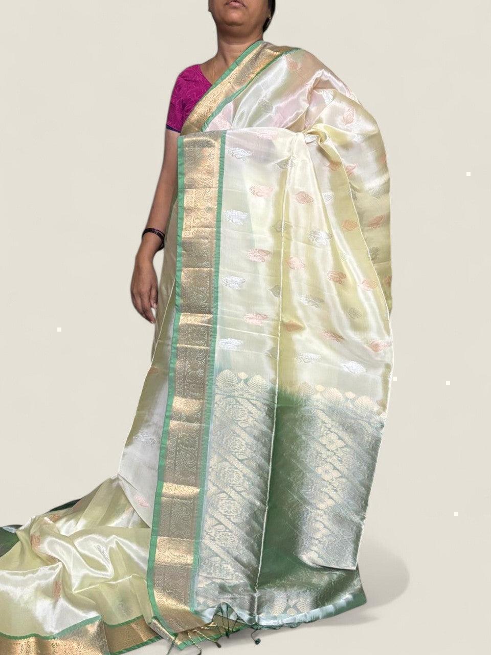 PURE SOFT SILK SAREE CREAM AND ANANDA BLUE WITH ALLOVER ZARI WEAVES BUTTAS IN BORDER TISSUE STYLE - pochampallysarees.com
