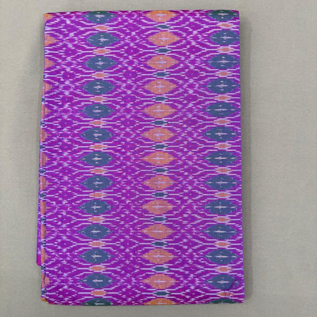 Vibrant purple Pochampally ikkat sico unstitched dress material with intricate geometric patterns.