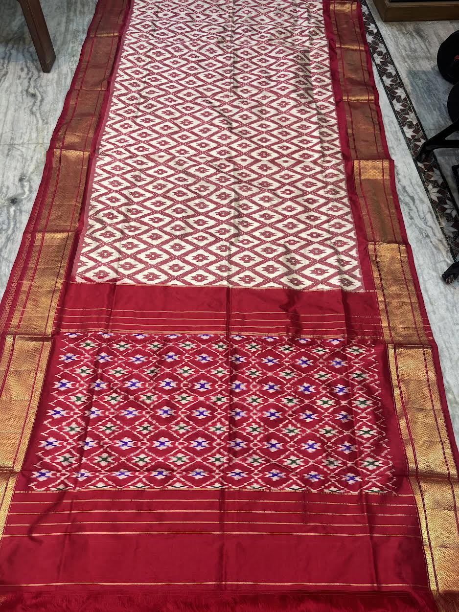 Elegant Red and Cream Pure Ikat Silk Saree with Rich Gold Zari Border