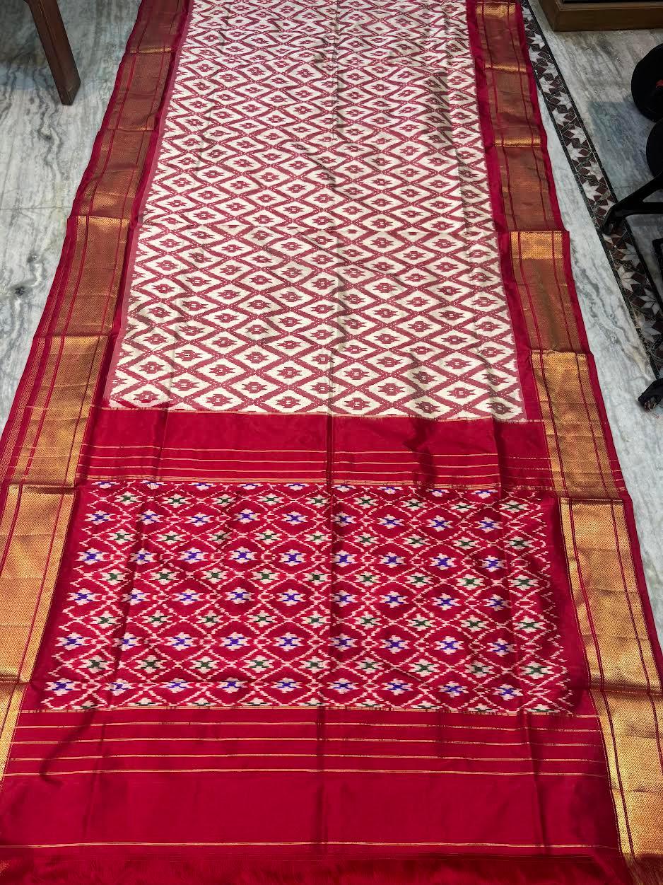 Pure Ikat Silk Patola Saree with Rich Gold Zari Border - pochampallysarees.com