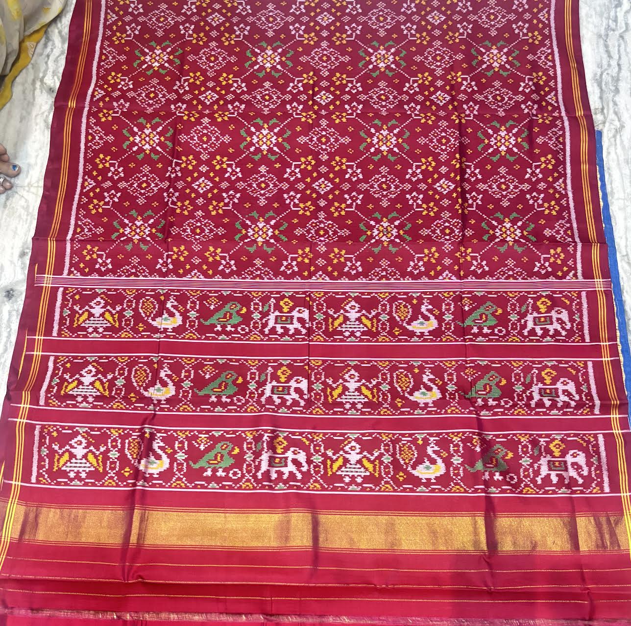 Maroon Real Ikkat Patola Silk Saree with Geometric Weave and Figural Border