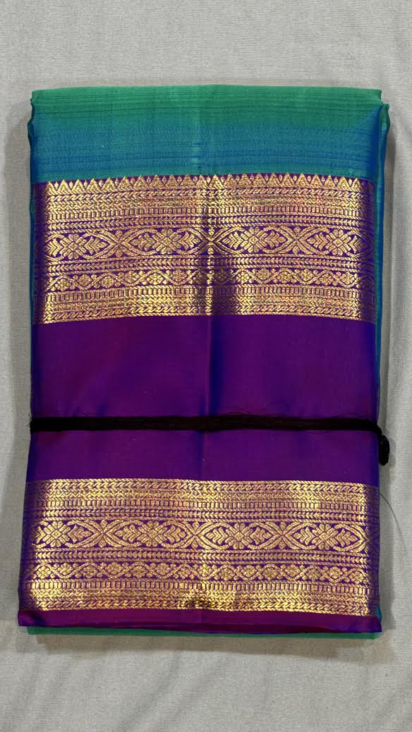 Pure Kanchipuram Pattu Saree in Teal Blue with Royal Purple Zari Pallu