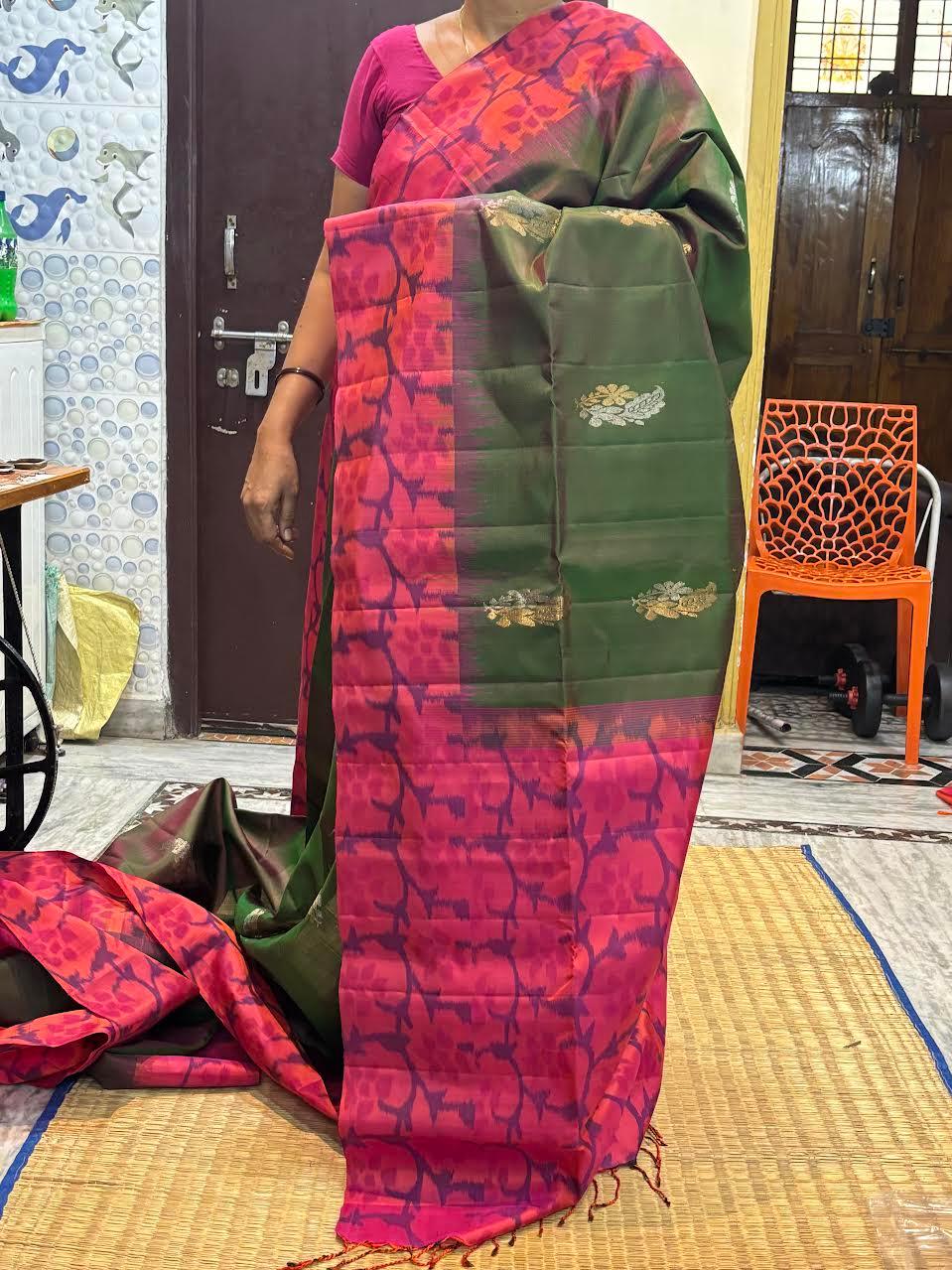 Kanchi Soft Silk Saree in Olive Green with Floral Jamdani Weave Border & Golden Mango Buttas