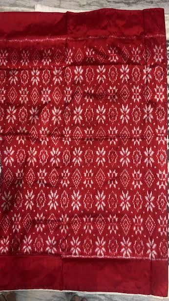 Elegant Off-White Ikat Silk Patola Saree with Contrast Red Blouse