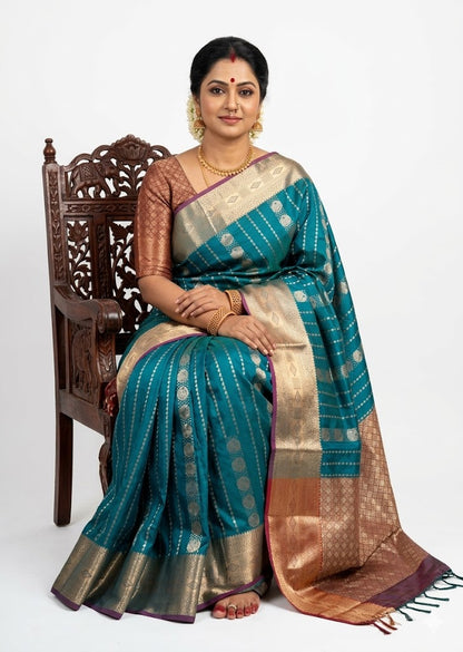 Elegant Teal Blue Dharmavaram Pattu Saree with Silver Zari Stripes and Copper Pallu