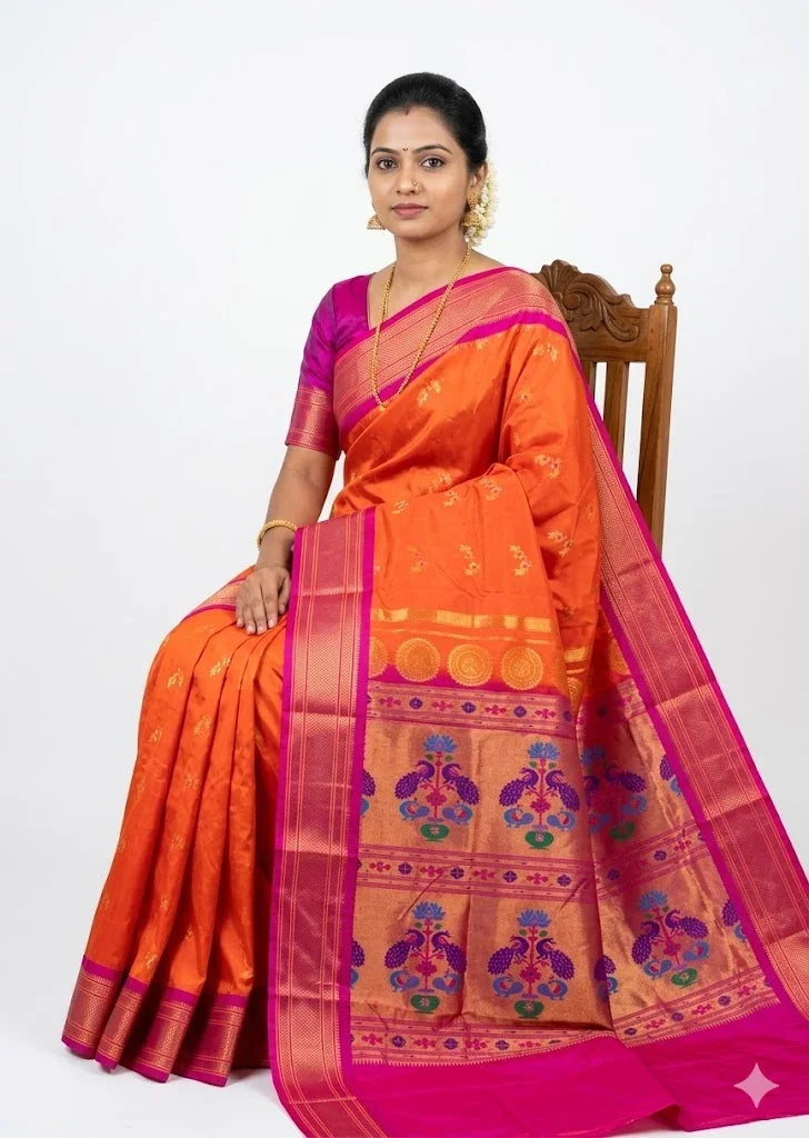 Traditional Orange Gadwal Silk Saree with Intricate Peacock Pallu and Magenta Border - pochampallysarees.com