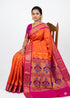 Traditional Orange Gadwal Silk Saree with Intricate Peacock Pallu and Magenta Border - pochampallysarees.com