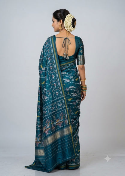Elegant Teal Blue Patola Silk Saree with Traditional Motifs