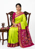 Vibrant Parrot Green and Pink Ikat Silk Saree with Zari Border - pochampallysarees.com