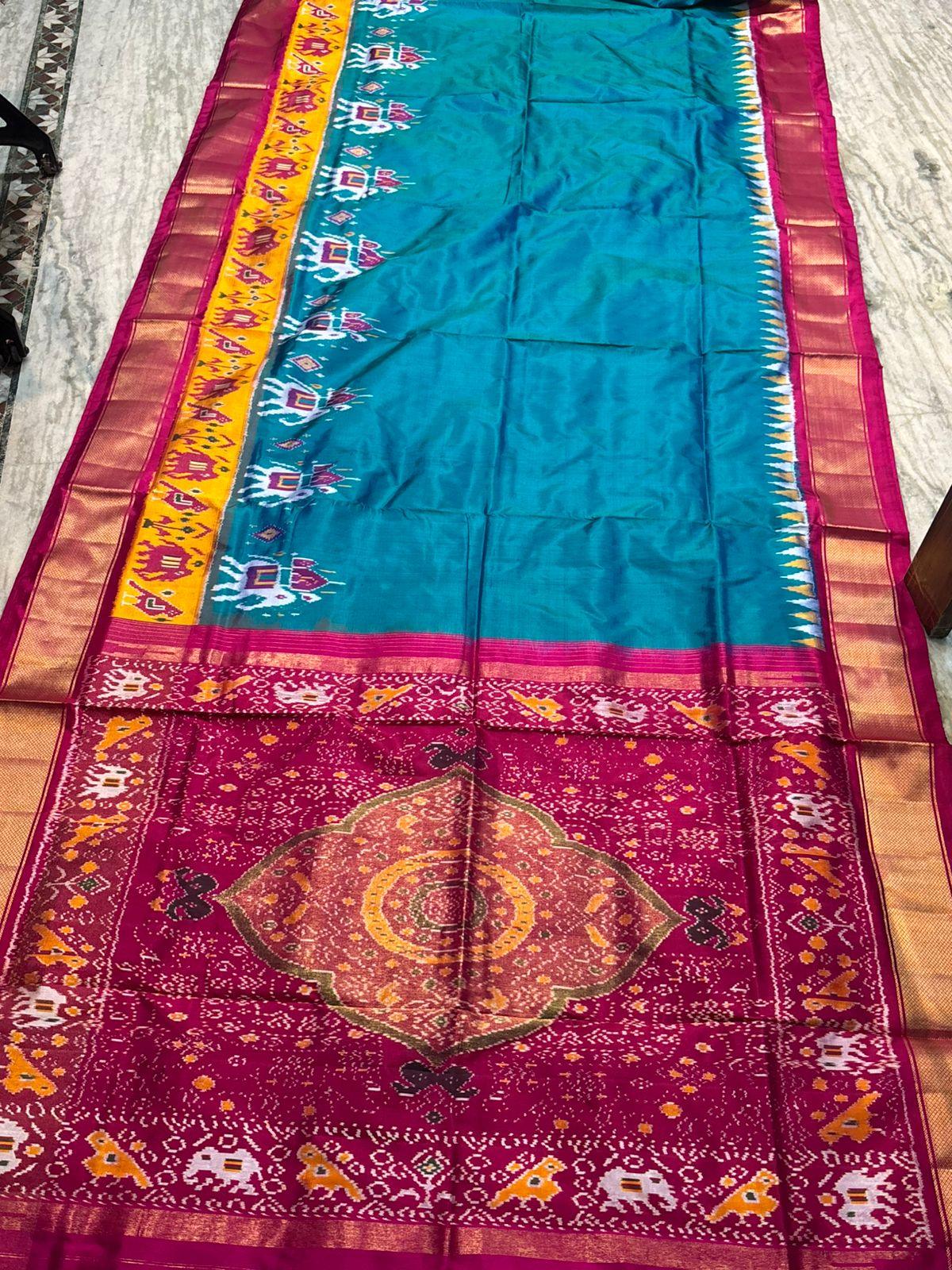 Pure Pochampally Ikkat Silk Saree in Teal &amp; Magenta | Elephant Motif Border | Traditional Handloom Pattu Saree - pochampallysarees.com