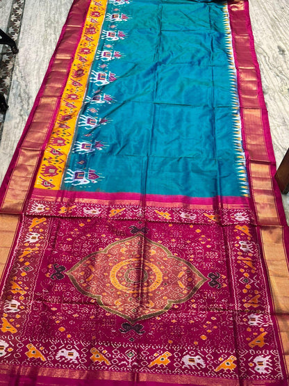 Pure Pochampally Ikkat Silk Saree in Teal &amp; Magenta | Elephant Motif Border | Traditional Handloom Pattu Saree - pochampallysarees.com