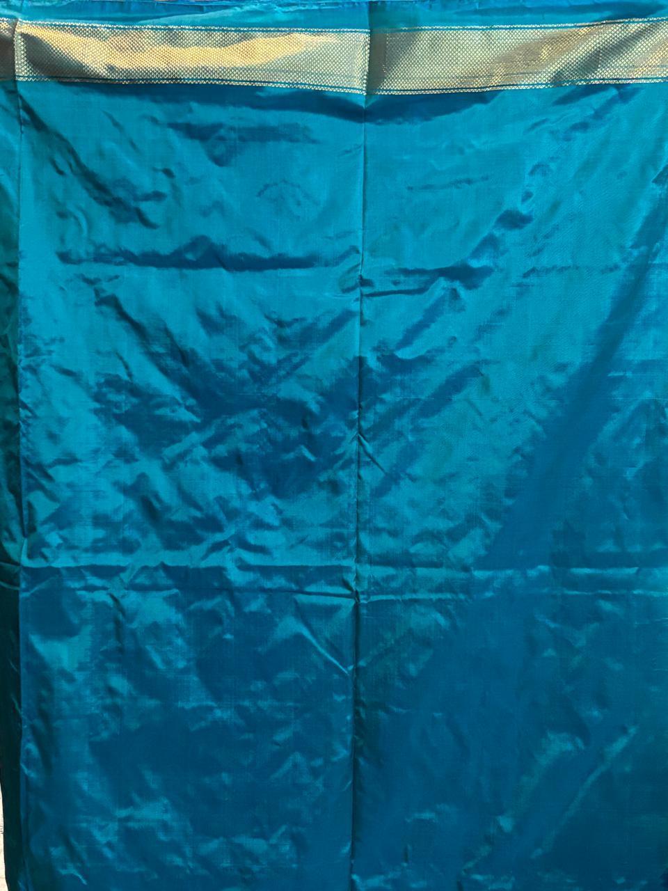 POCHAMPALLY IKKAT SILK PATOLA MIDDLE NAVY BLUE BORDER AND PALLU BLUE ZARI BORDER PLAIN DESIGN SAREE - pochampallysarees.com