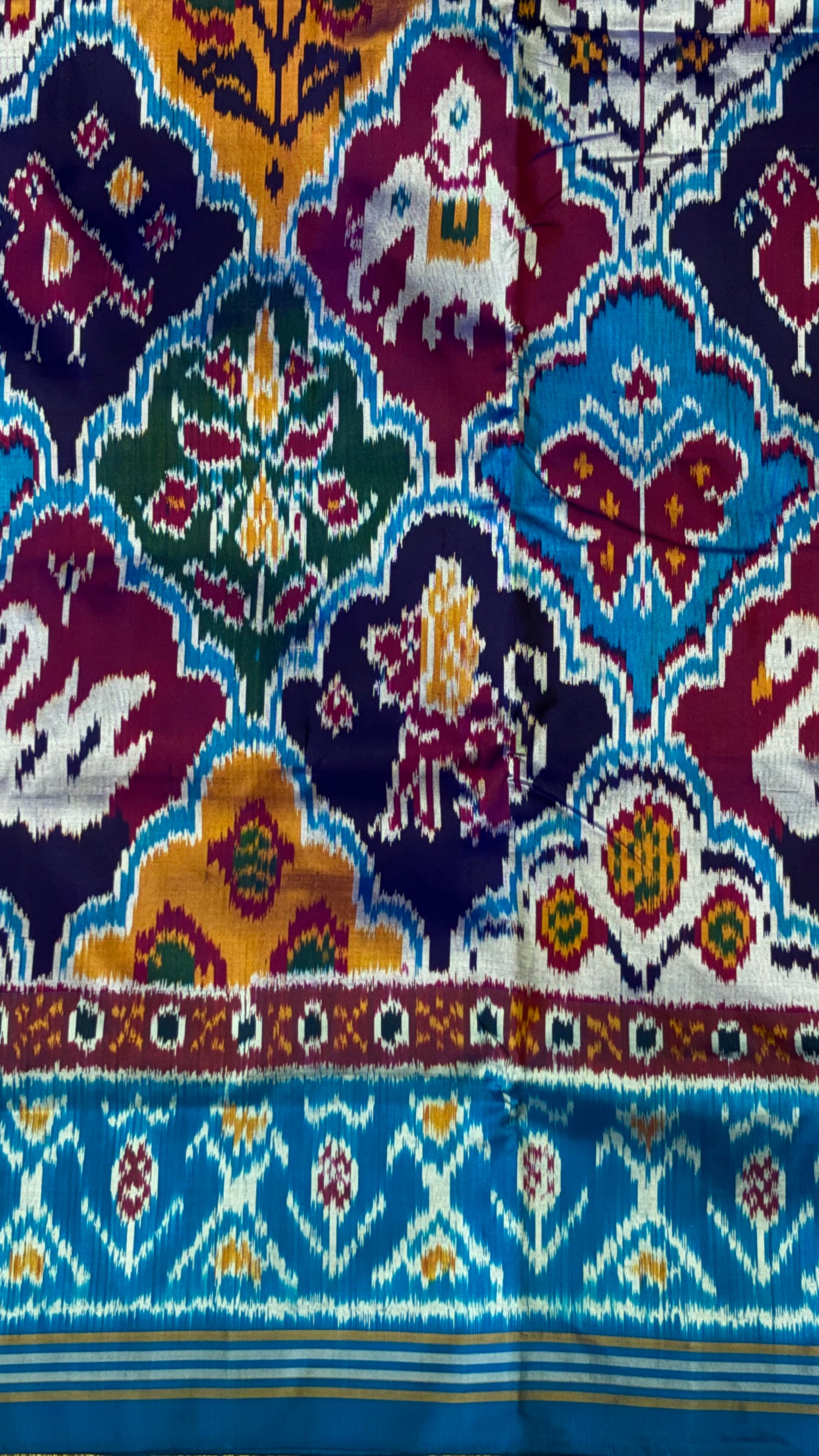 Royal Blue &amp; Maroon Patola-Inspired Ikat Silk Saree with Traditional Elephant Motifs - pochampallysarees.com