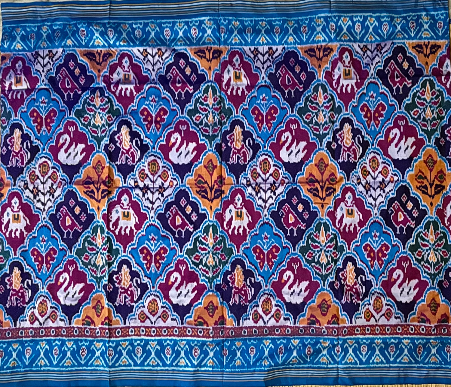Royal Blue &amp; Maroon Patola-Inspired Ikat Silk Saree with Traditional Elephant Motifs - pochampallysarees.com