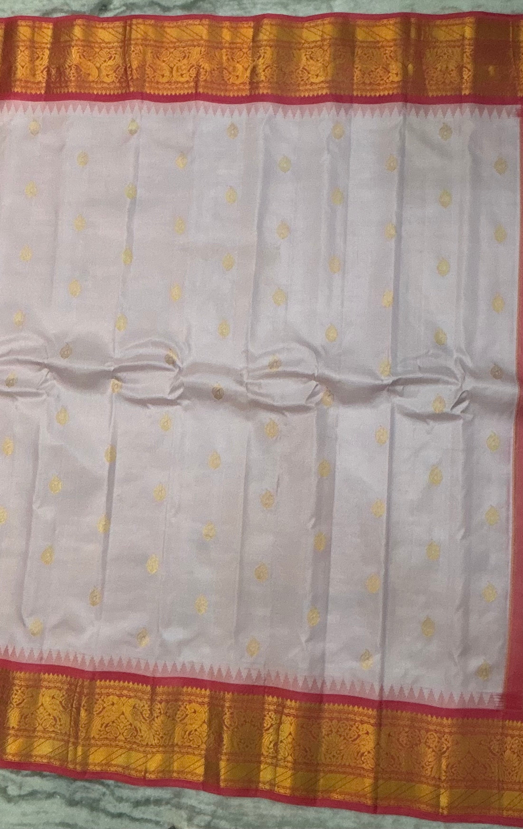 Elegant Off-White Pure Silk Saree with Contrasting Pink Zari Border and Mango Buttas