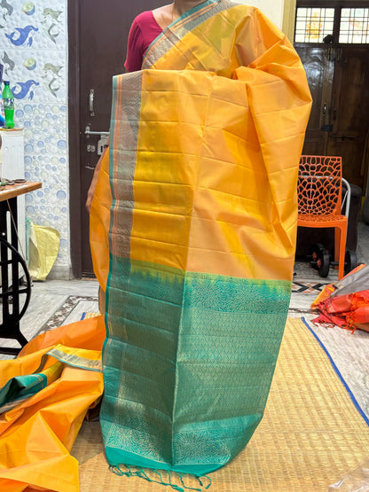 Kanchi Soft Silk Saree in Muted Gold with Teal Green Zari Border and Matching Blouse