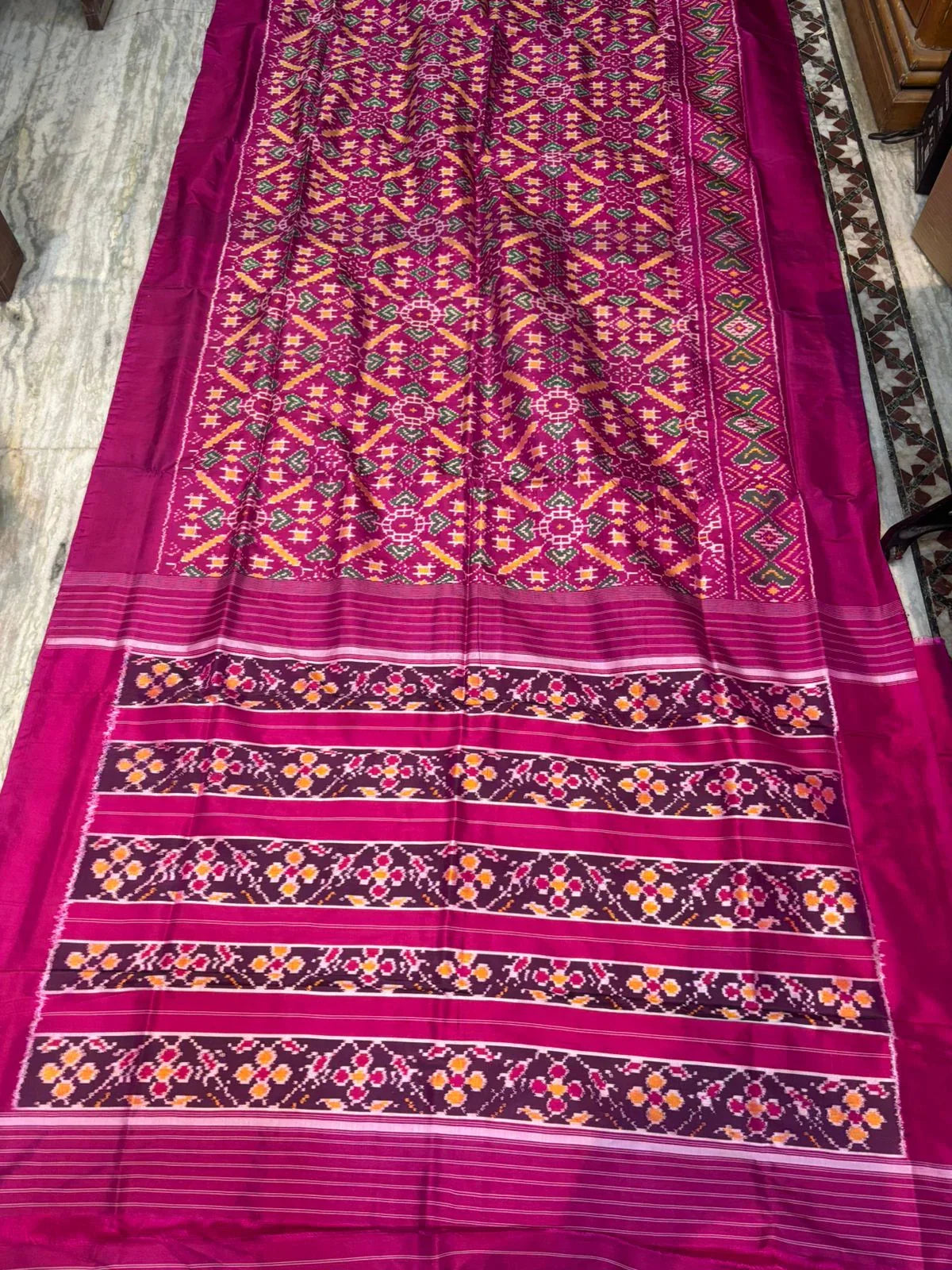 Pure Ikkat Patola Silk Saree in Magenta Pink with Plain Border | Handwoven Traditional Festive Wear - pochampallysarees.com