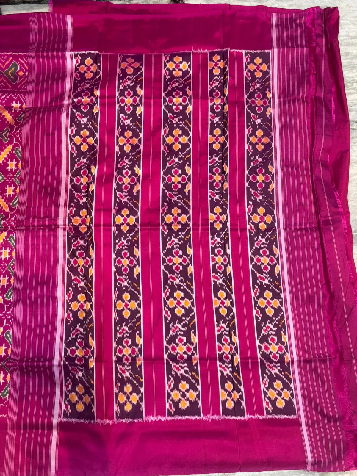 Pure Ikkat Patola Silk Saree in Magenta Pink with Plain Border | Handwoven Traditional Festive Wear - pochampallysarees.com