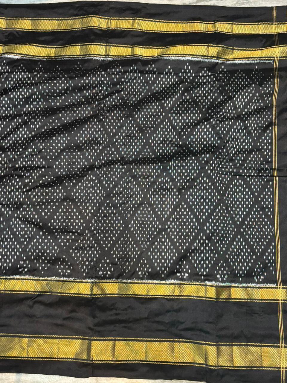 Exquisite Black Ikkat Patola Silk Saree with Rich Golden Zari Border | Silk Mark Certified - pochampallysarees.com