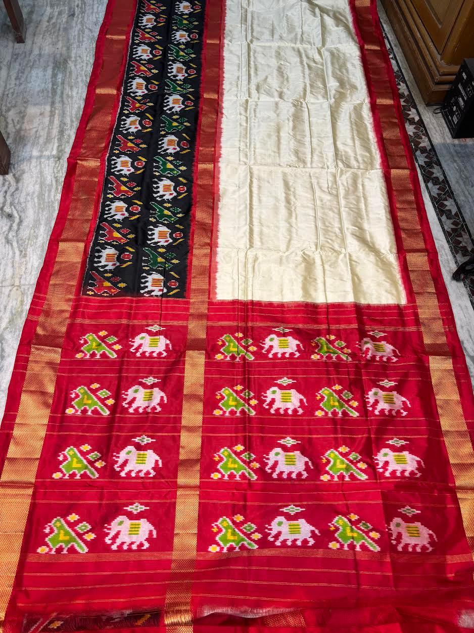 Traditional Cream &amp; Red Ikkat Silk Saree with Black Elephant Motif Border | Pochampally Handloom - pochampallysarees.com